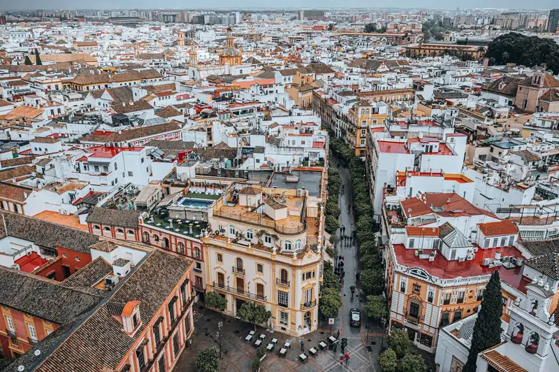 Captivating aerial view of Seville, Spain showcasing its dense, historic urban architecture.